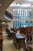 Sanctuary showing the mechitza (separate seating for women) at Ohr HaTorah in North Dallas